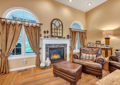 cozy fireplace and leather chair real estate photo in Hartford CT