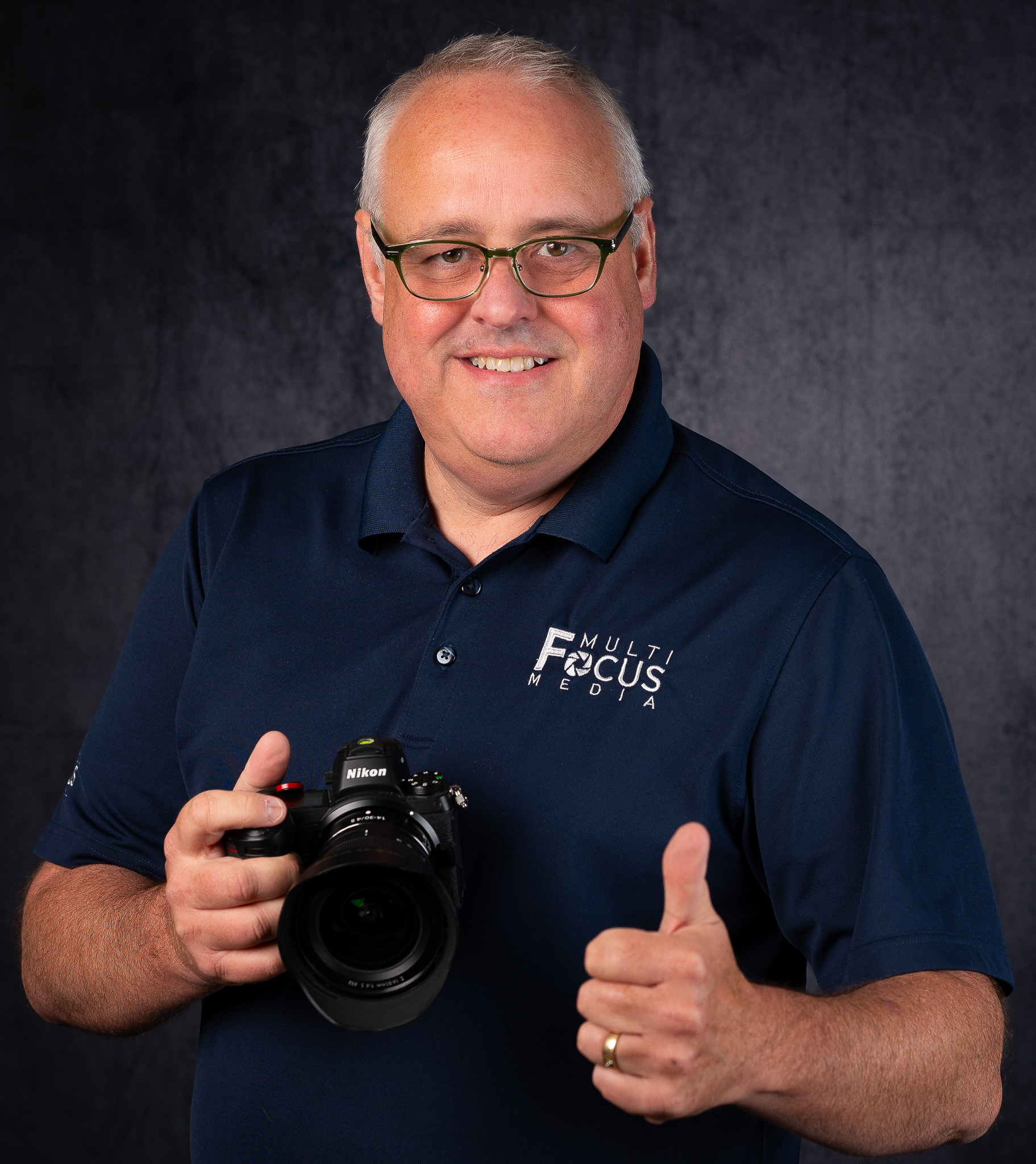 self portrait of Hank Jonkman from Multi-Focus Media holding camera